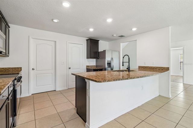 1009 CULBREATH GREEN COURT, Ruskin, FL 33570