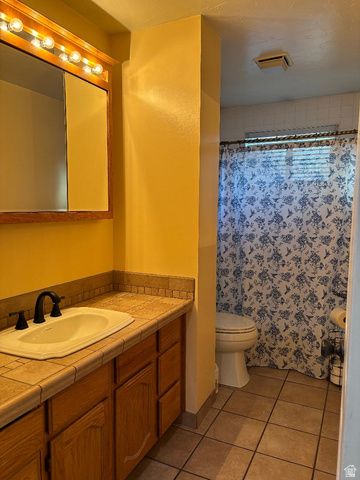 5346 S QUEENSWOOD DR, Taylorsville, UT 84129