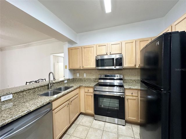 12843 MADISON POINTE CIRCLE E 201, Orlando, FL 32821