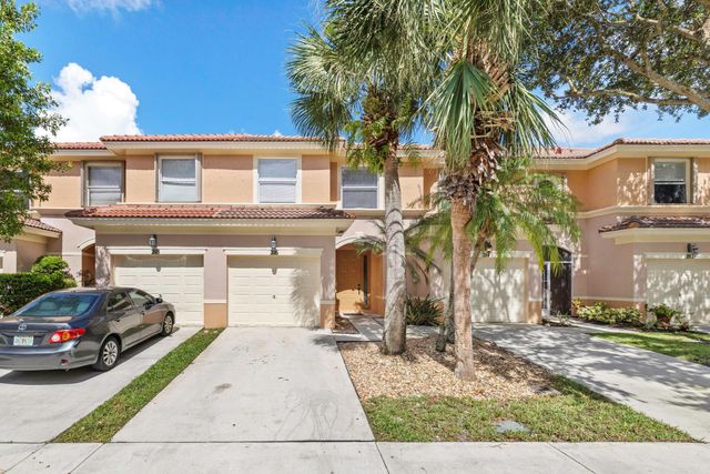 216 River Bluff Lane, Royal Palm Beach, FL 33411