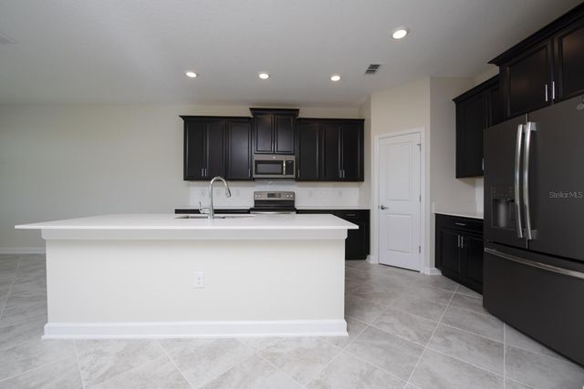 1037 BLACKWOLF RUN ROAD, Davenport, FL 33896