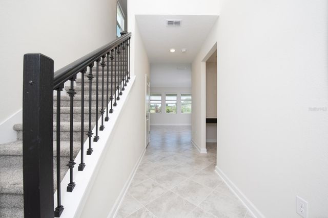 1037 BLACKWOLF RUN ROAD, Davenport, FL 33896