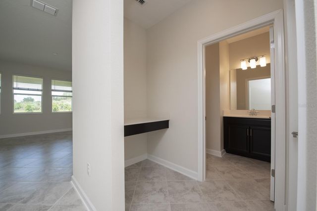 1037 BLACKWOLF RUN ROAD, Davenport, FL 33896