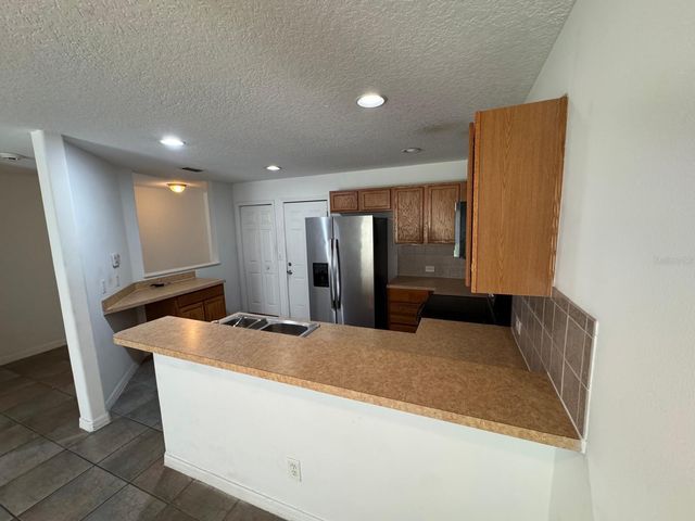 561 CRESTING OAK CIRCLE 86, Orlando, FL 32824
