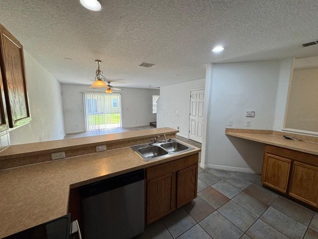 561 CRESTING OAK CIRCLE 86, Orlando, FL 32824