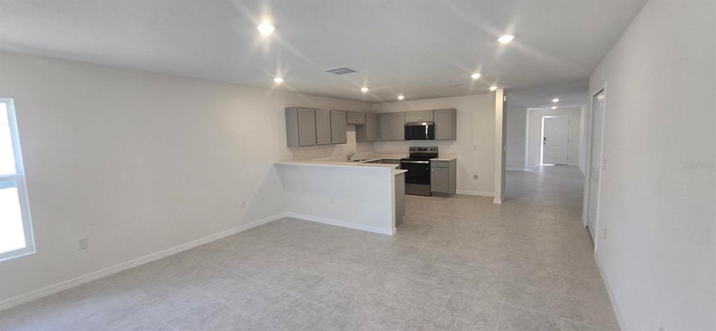 Image 7 of property listing at 1723 REDFIN WAY, Poinciana, FL 34759