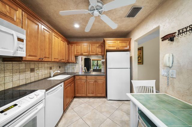 21669 TALL PALM Circle 1B, Boca Raton, FL 33433