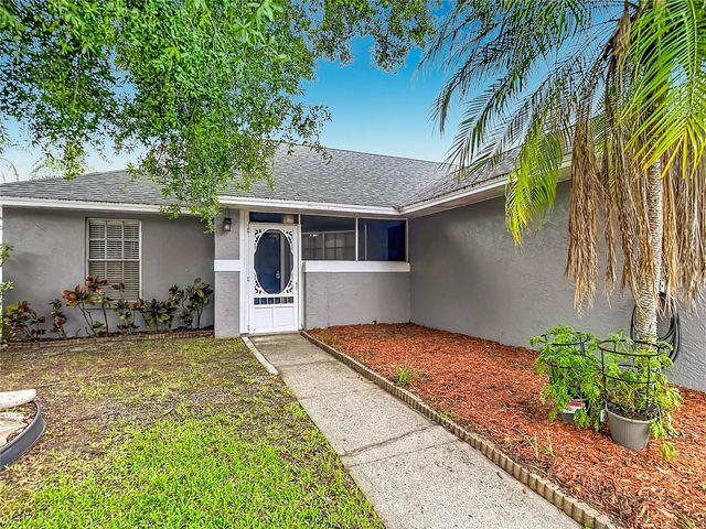 7110 HOLLOWELL DRIVE, Tampa, FL 33634