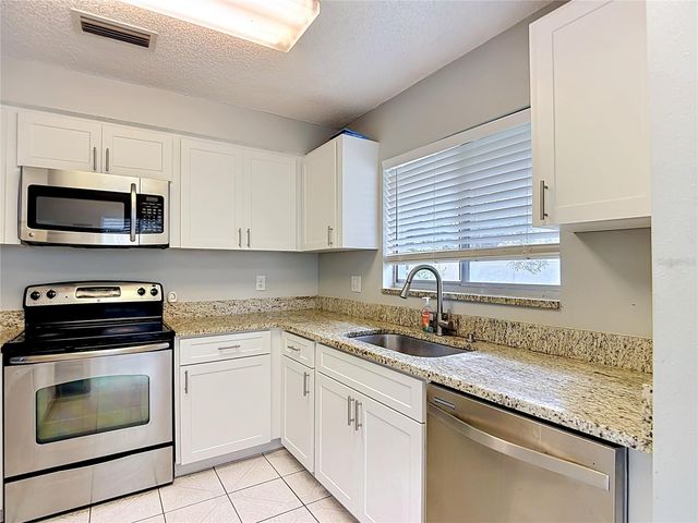 7110 HOLLOWELL DRIVE, Tampa, FL 33634
