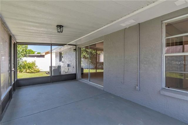 7110 HOLLOWELL DRIVE, Tampa, FL 33634