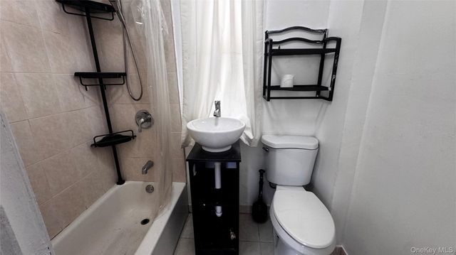 9009 143rd Street, Jamaica, NY 11435