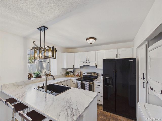 9715 W Chatfield Avenue E, Littleton, CO 80128