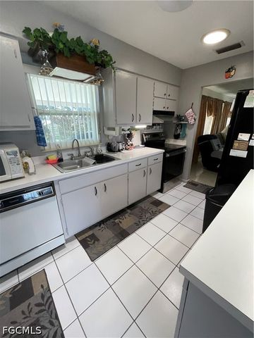 225 Lake DR, Lehigh Acres, FL 33936