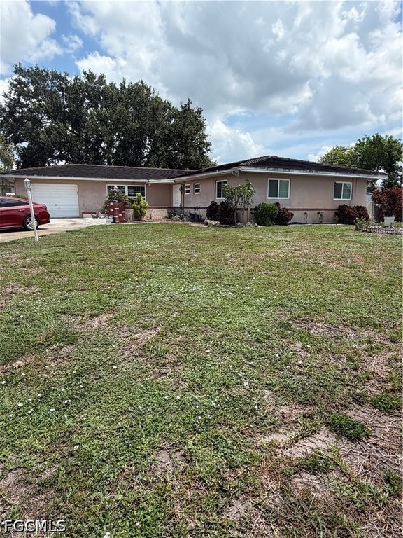 225 Lake DR, Lehigh Acres, FL 33936
