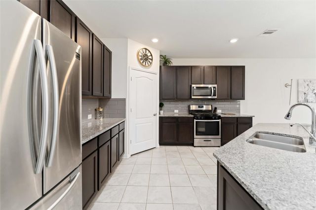 5203 Castle Discordia Street, Katy, TX 77493