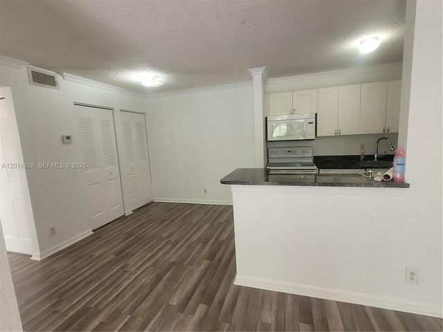 10773 Cleary Boulevard 203, Plantation, FL 33324