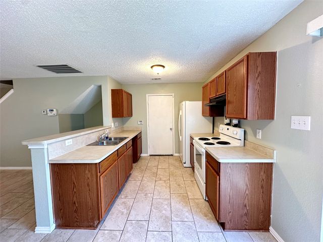 7049 Wax Berry Drive, Dallas, TX 75249