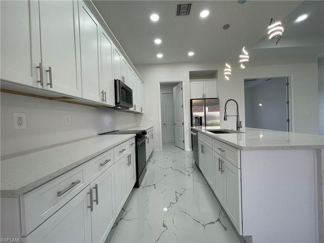 2327 NW 28th AVE, Cape Coral, FL 33993