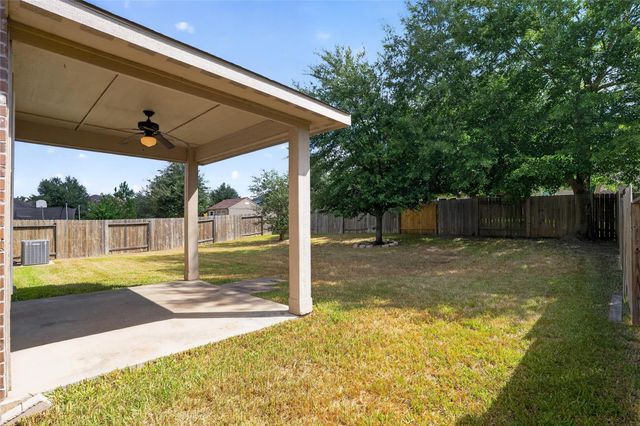 7611 Dragon Pearls Lane, Conroe, TX 77304