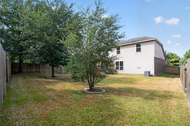 7611 Dragon Pearls Lane, Conroe, TX 77304