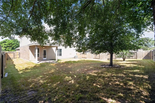 7611 Dragon Pearls Lane, Conroe, TX 77304