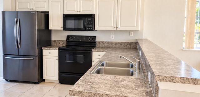 1977 MARSH HARBOR Drive 402, Riviera Beach, FL 33404