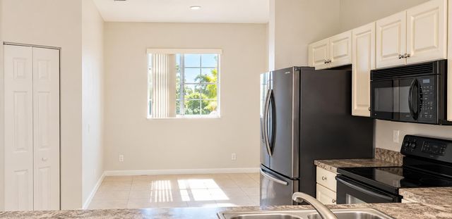 1977 MARSH HARBOR Drive 402, Riviera Beach, FL 33404