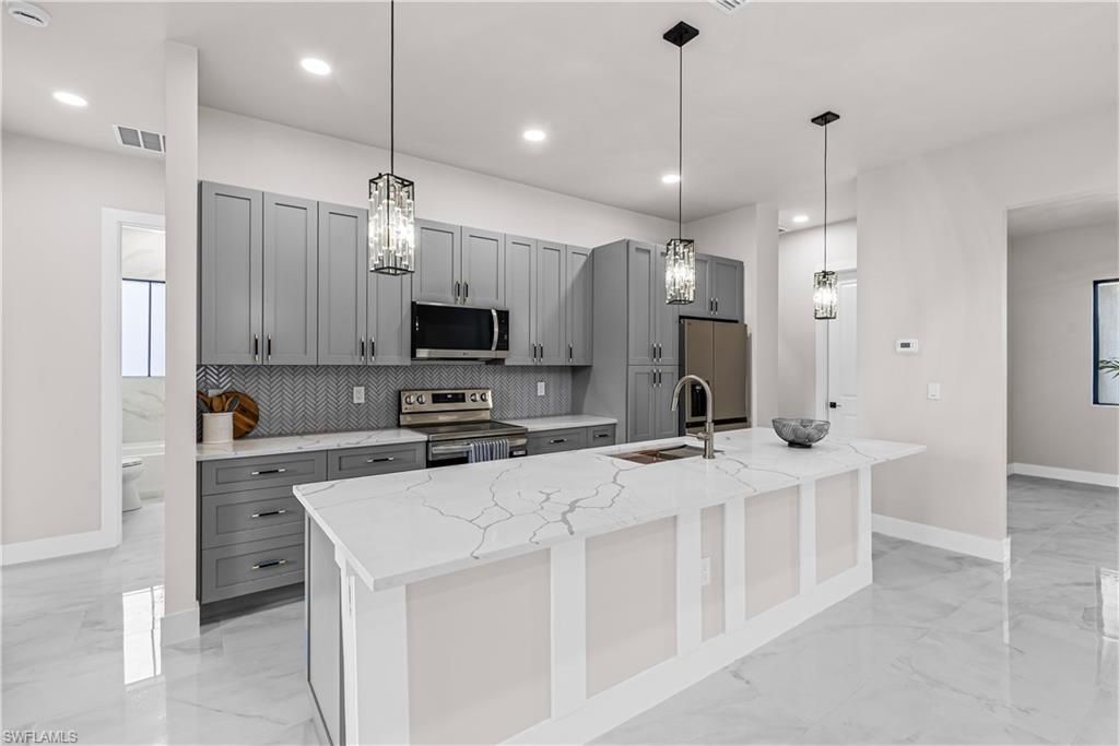 2711 10th ST W, LEHIGH ACRES, FL 33971 — photo 4