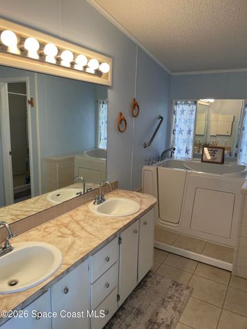 706 Lantania Drive, Barefoot Bay, FL 32976