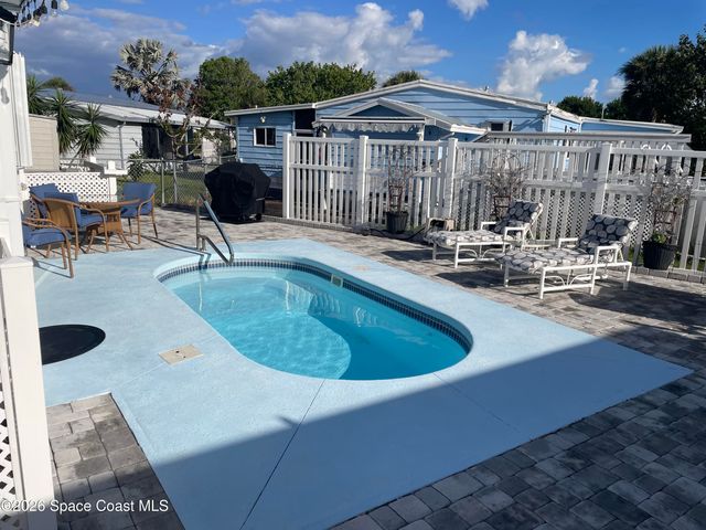 706 Lantania Drive, Barefoot Bay, FL 32976