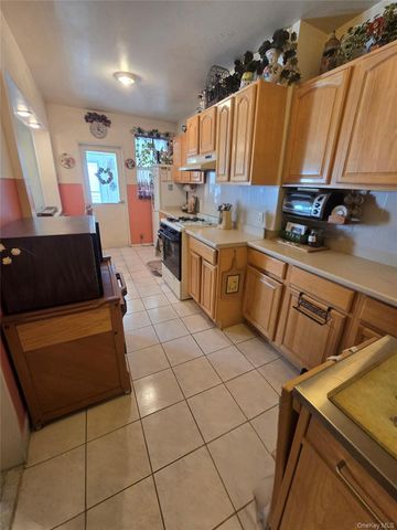 92-10 91st Avenue, Woodhaven, NY 11421