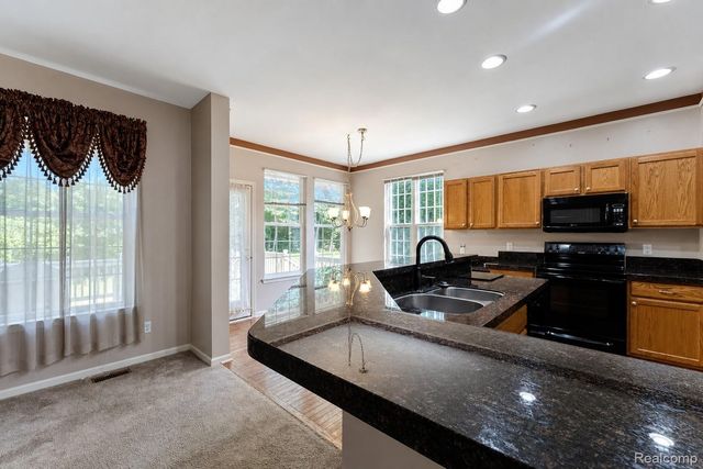 969 Hidden Creek Drive, South Lyon, MI 48178