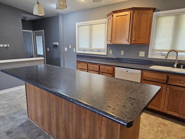 7710 N Edgeworth DRIVE, Milwaukee, WI 53223