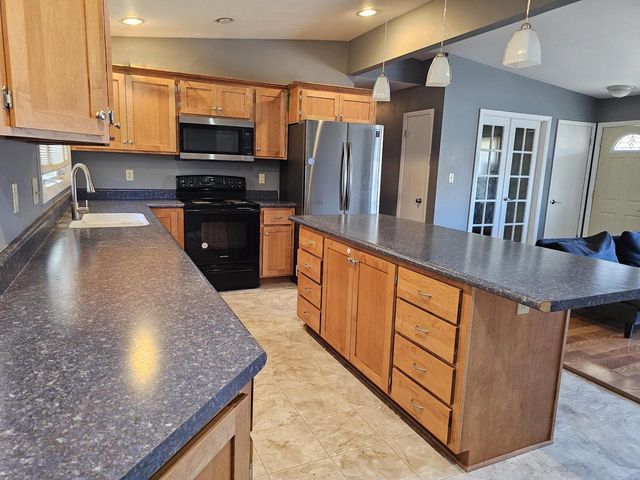 7710 N Edgeworth DRIVE, Milwaukee, WI 53223