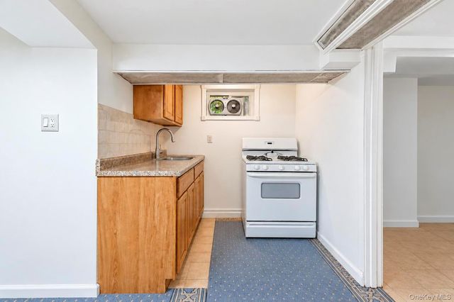 103-11 90th Street, Ozone Park, NY 11417