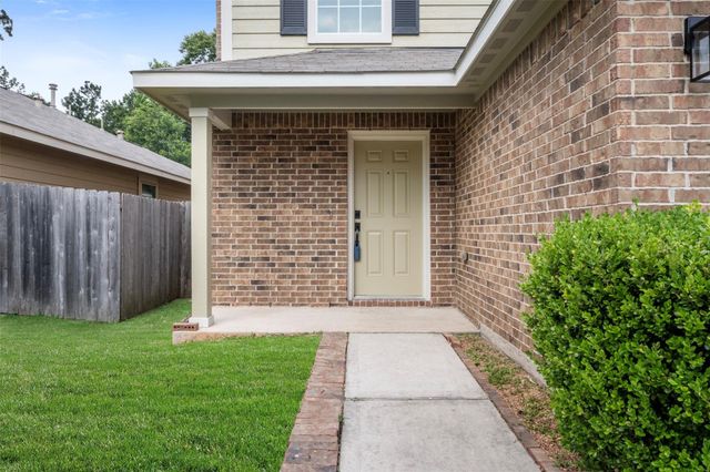 9987 Sterling Place Drive, Conroe, TX 77303