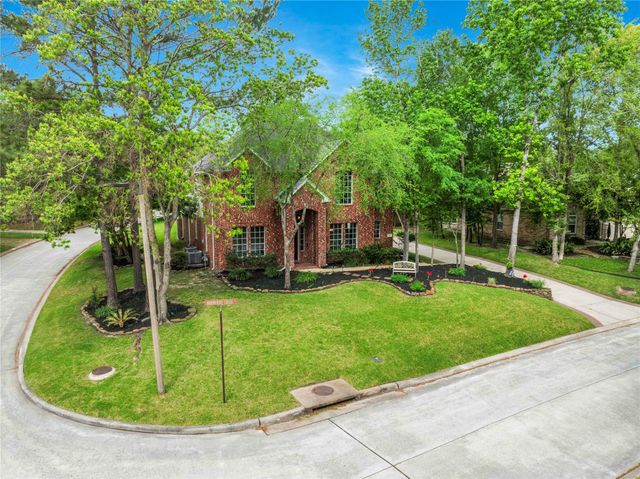 3 Murmuring Creek Place, Conroe, TX 77385