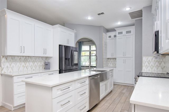 10537 VERSAILLES BOULEVARD, Clermont, FL 34711