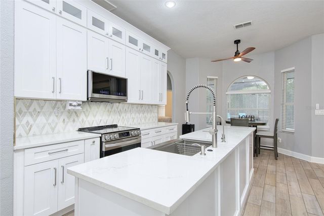 10537 VERSAILLES BOULEVARD, Clermont, FL 34711