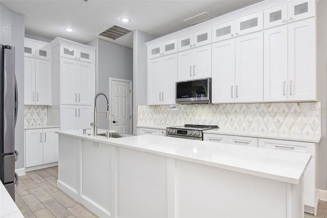 10537 VERSAILLES BOULEVARD, Clermont, FL 34711