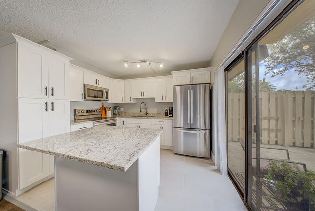 187 Woodland Road, Palm Springs, FL 33461