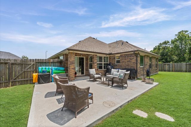 115 Cobblestone Court, Magnolia, TX 77354