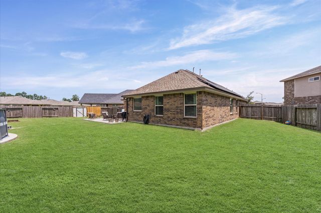 115 Cobblestone Court, Magnolia, TX 77354