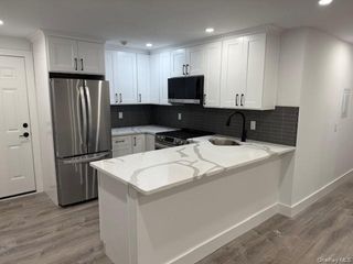 19 Bellport Lane 1, Bellport Village, NY 11713