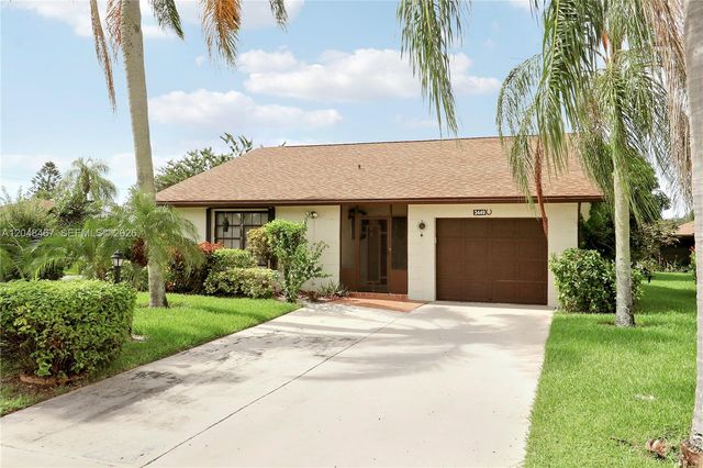 3449 Shadow Wood Dr, Green Acres, FL 33463