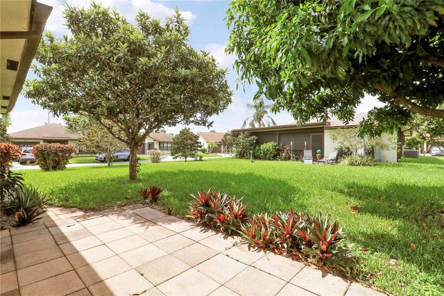 3449 Shadow Wood Dr, Green Acres, FL 33463