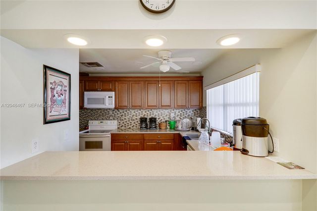 3449 Shadow Wood Dr, Green Acres, FL 33463