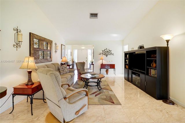 3449 Shadow Wood Dr, Green Acres, FL 33463