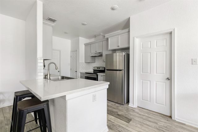 451 County Road 2358, Hardin, TX 77575