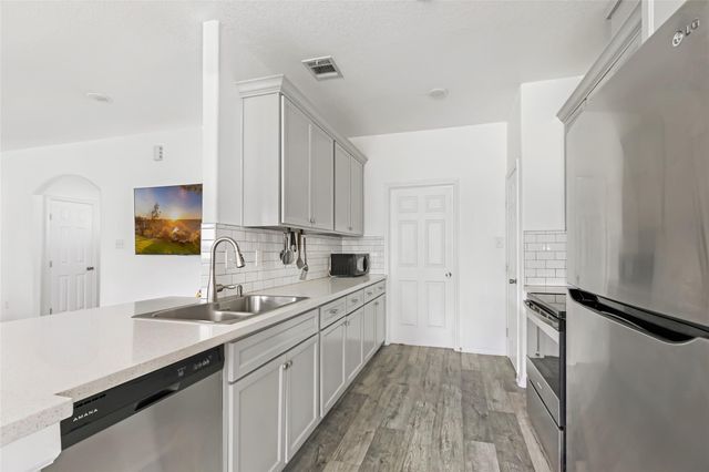 451 County Road 2358, Hardin, TX 77575